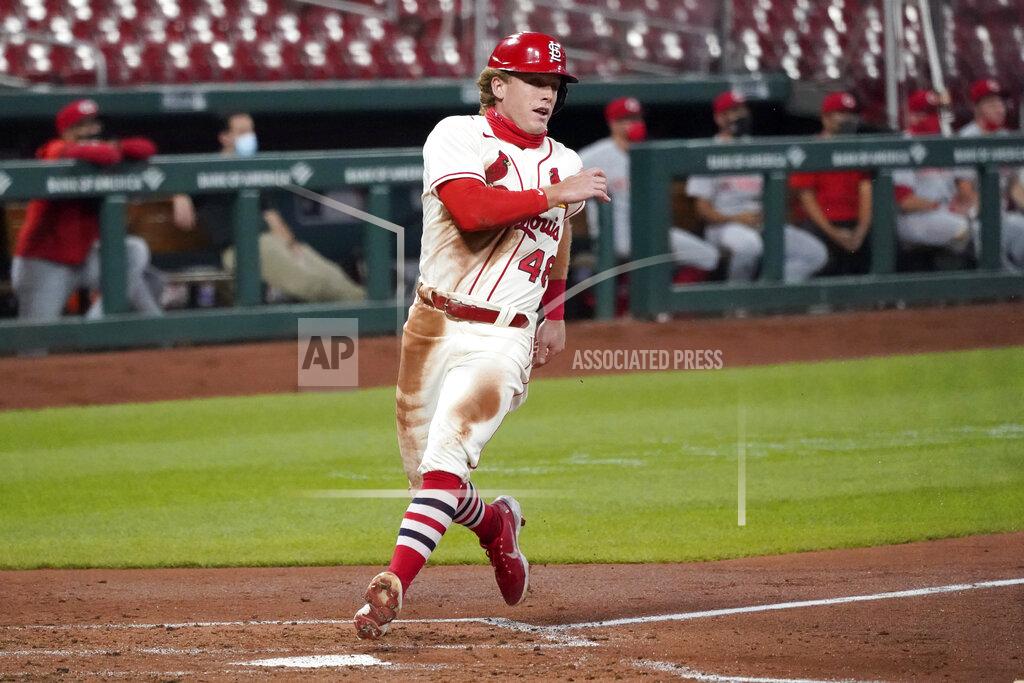 Jeff Roberson St. Louis Cardinals' Harrison Bader scores during the third inning of a baseball game against the Cincinnati Reds Saturday, Aug. 22, 2020, in St. Louis. (AP Photo/Jeff Roberson)