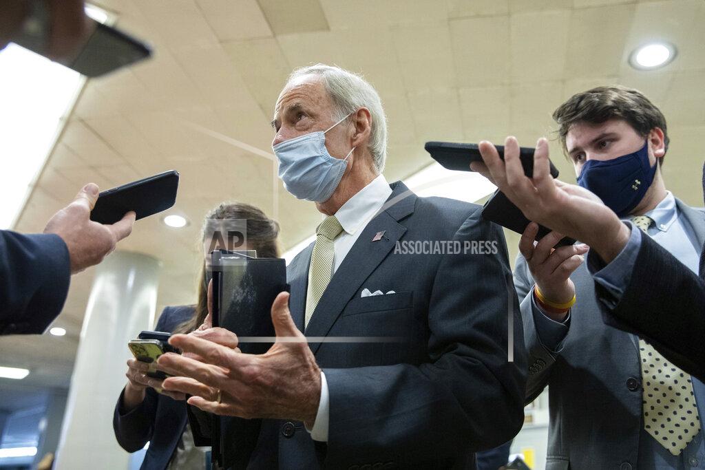 Amanda Andrade-Rhoades Sen. Tom Carper, D-Del., speaks to reporters amid continuing talks around the $1 trillion bipartisan infrastructure bill on Capitol Hill in Washington, Tuesday, Aug. 3, 2021. (AP Photo/Amanda Andrade-Rhoades)