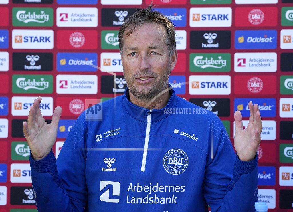 Martin Meissner Denmark's manager Kasper Hjulmand talks to the media prior a training session of Denmark's national team in Helsingor, Denmark, Tuesday, June 15, 2021. It is the second training of the Danish team since the Euro championship soccer match against Finland when Christian Eriksen collapsed last Saturday. (AP Photo/Martin Meissner)