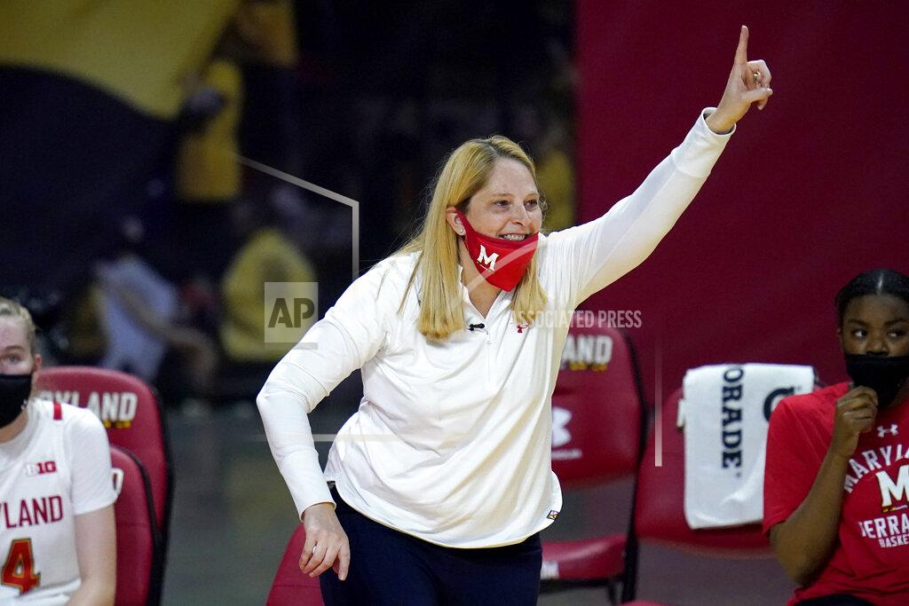 Julio Cortez Maryland head coach Brenda Frese reacts during the second half of an NCAA college basketball game against Wisconsin, Thursday, Feb. 4, 2021, in College Park, Md. Frese tied a school record with her 499th win, reaching the milestone by guiding the 10th-ranked Terrapins past Wisconsin 84-48. Frese matched the mark set by Hall of Fame coach Chris Weller, who was at Maryland from 1975-2002. Weller was replaced by Frese, who's 499-130 over 19 seasons. (AP Photo/Julio Cortez)