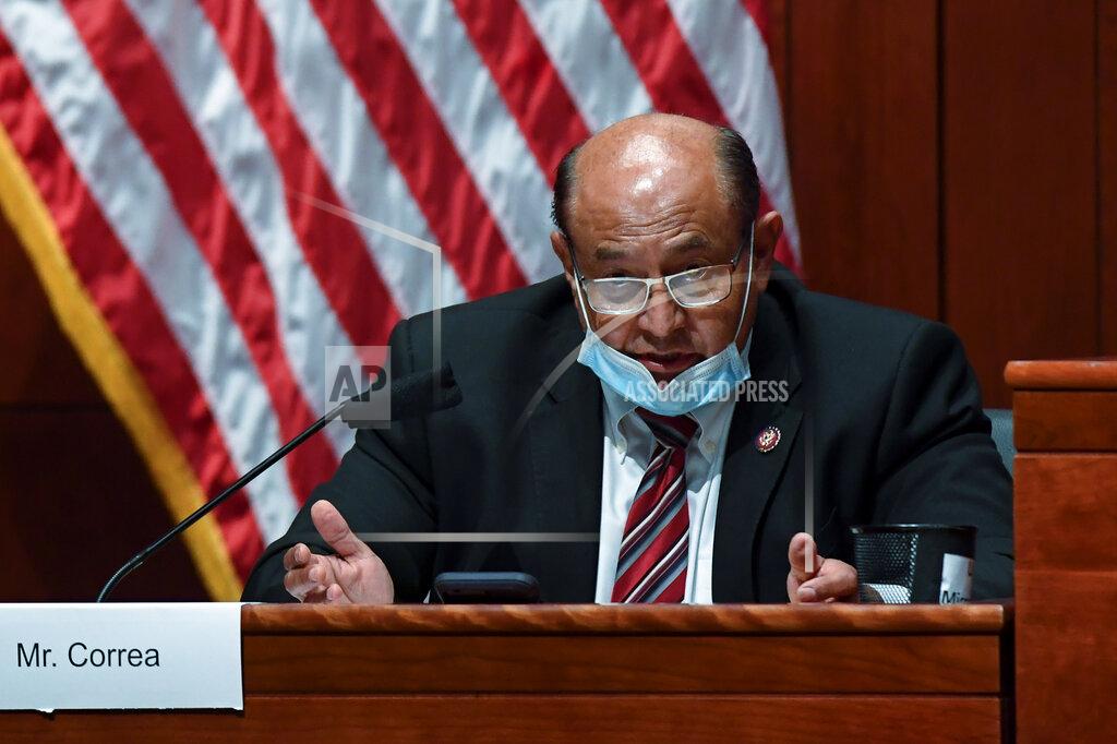 Matt Mcclain FILE - In this July 28, 2020, file photo, Rep. Lou Correa, D-Calif., questions Attorney General William Barr during a House Judiciary Committee hearing on the oversight of the Department of Justice on Capitol Hill in Washington. Rep. Correa announced Saturday, Jan. 16, 2021 he tested positive upon returning home from Washington, D.C., prompting him to self-quarantine away from his family. His office said he received the first dose of the Pfizer-BioNTech vaccine on Dec. 19 and has not received the second shot that would have boosted his immunity to about 95%. (Matt McClain/The Washington Post via AP, Pool, File)
