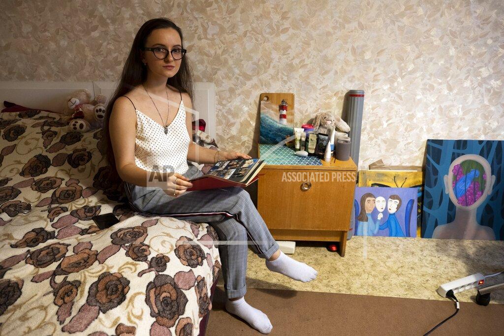 Daniel Kozin Anastasia Kuznetsova, a 20-year-old fiancée of an American citizen from California, speaks during her interview with the Associated Press in Moscow, Russia, Saturday, May 8, 2021. Like many others in the situation, Anastasia blames big politics for affecting the lives of ordinary people stuck in the middle. Until recently, she had been hoping to celebrate her wedding in the United States this year and had even quit her university in Russia in preparation for the move. (AP Photo/Daniel Kozin)