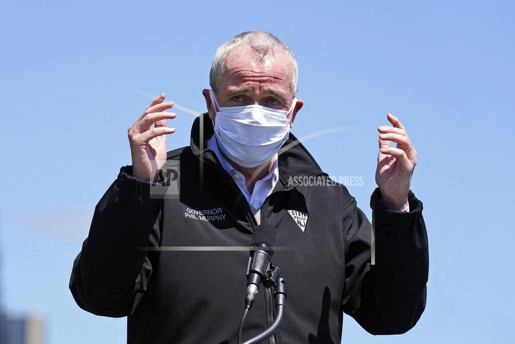 Seth Wenig New Jersey Gov. Phil Murphy speaks during a news conference in Hoboken, N.J., Thursday, May 6, 2021. More than eight years after Superstorm Sandy overwhelmed the New York City area, Hoboken is breaking ground on a flood resiliency project that is part of a $230 million plan funded by the U.S. Department of Housing and Urban Development. (AP Photo/Seth Wenig)