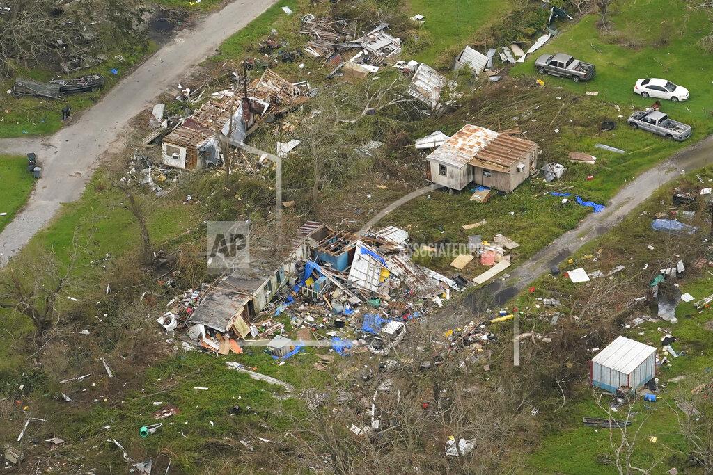 Matt Slocum In this aerial photo, the remains of destroyed homes are seen in the aftermath of Hurricane Ida, Monday, Sept. 6, 2021, in Lafitte, La. (AP Photo/Matt Slocum)