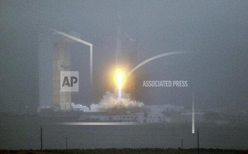 A United Launch Alliance Atlas V rocket lifts off carrying the Landsat 9 earth imaging satellite from Vandenberg Space Force Base, Calif., on Monday, Sept. 27, 2021. It is the latest in a series of U.S. satellites that has recorded human and natural impacts on Earth's surface for decades. (Matt Hartman via AP)