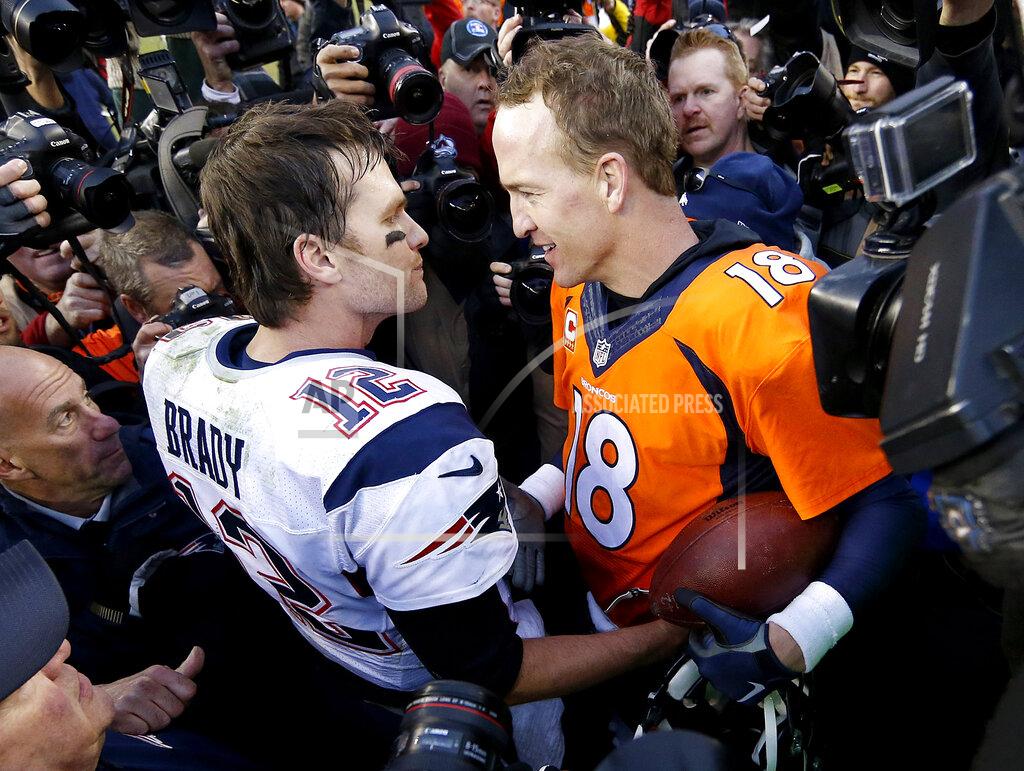 David Zalubowski FILE - In this Jan. 24, 2016, file photo, New England Patriots quarterback Tom Brady, left, and Denver Broncos quarterback Peyton Manning speak to one another following the NFL football AFC championship game in Denver. Tiger Woods and Phil Mickelson are ready for a made-for-TV rematch at a time when fans are craving live action. And this time, they'll have company. Turner Sports says Brady and Manning will join them for a two-on-two match sometime in May. Missing from the announcement were such details as when and where the match would be played, except that tournament organizers would work with government and health officials to meet safety and health standards. (AP Photo/David Zalubowski, File)