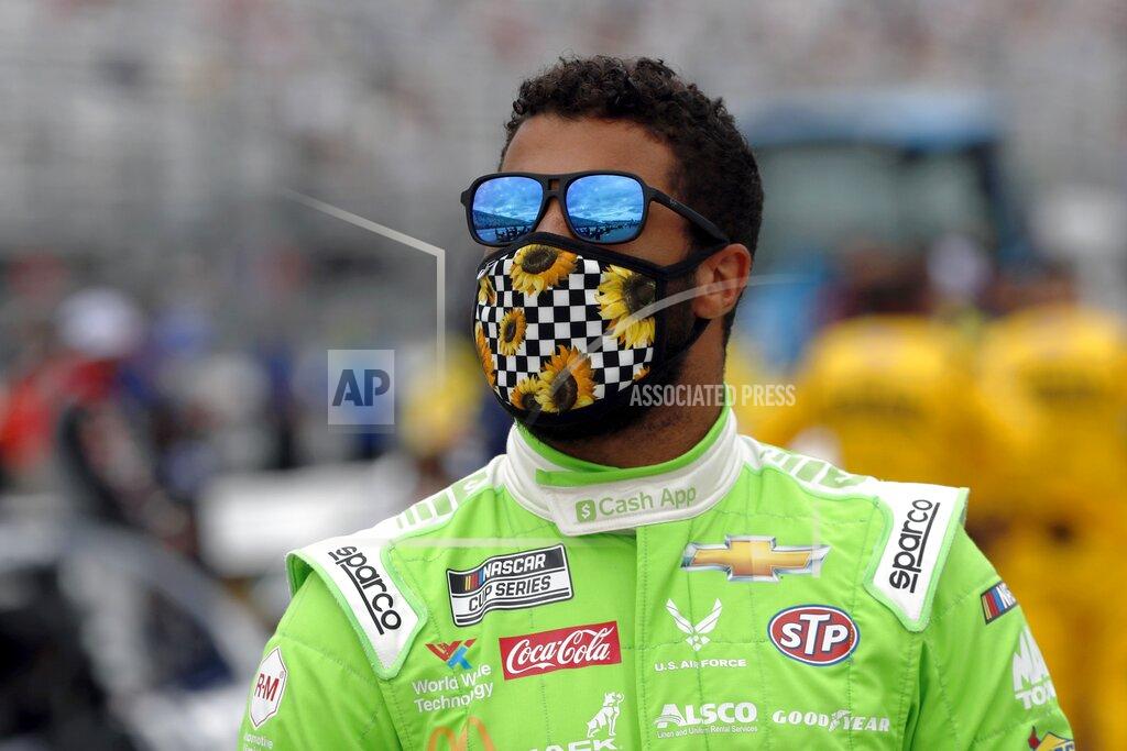 Charles Krupa Driver Bubba Wallace waits for the start of a NASCAR Cup Series auto race, Sunday, Aug. 2, 2020, at the New Hampshire Motor Speedway in Loudon, N.H. (AP Photo/Charles Krupa)