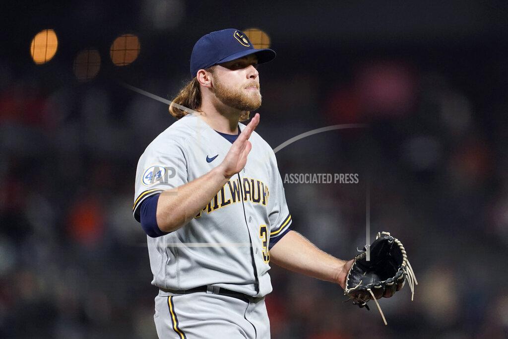 Jeff Chiu Milwaukee Brewers pitcher Corbin Burnes reacts after striking out San Francisco Giants' Buster Posey to end the sixth inning of a baseball game in San Francisco, Monday, Aug. 30, 2021. (AP Photo/Jeff Chiu)