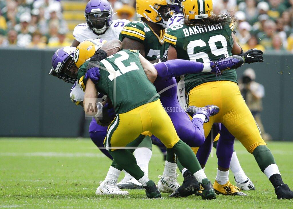 Mike Roemer Minnesota Vikings' Danielle Hunter sacks Green Bay Packers' Aaron Rodgers during the second half of an NFL football game Sunday, Sept. 15, 2019, in Green Bay, Wis. The Packers won 21-16. (AP Photo/Mike Roemer)