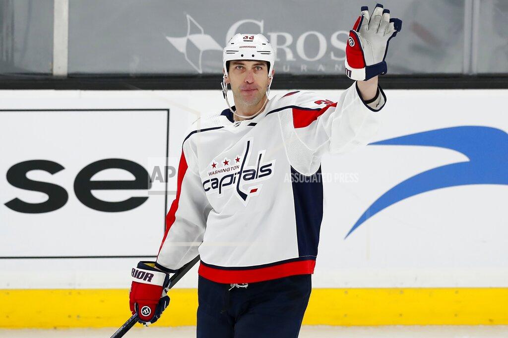 Michael Dwyer Washington Capitals' Zdeno Chara waves to the crowd after a video tribute during the first period of an NHL hockey game against his former team the Boston Bruins, Sunday, April 11, 2021, in Boston. (AP Photo/Michael Dwyer)