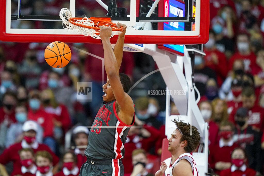 Andy Manis Ohio State's Zed Key (23) dunks past Wisconsin's Carter Gilmore (14) during the second half of an NCAA college basketball game Thursday, Jan. 13, 2022, in Madison, Wis. Wisconsin won 78-68. (AP Photo/Andy Manis)
