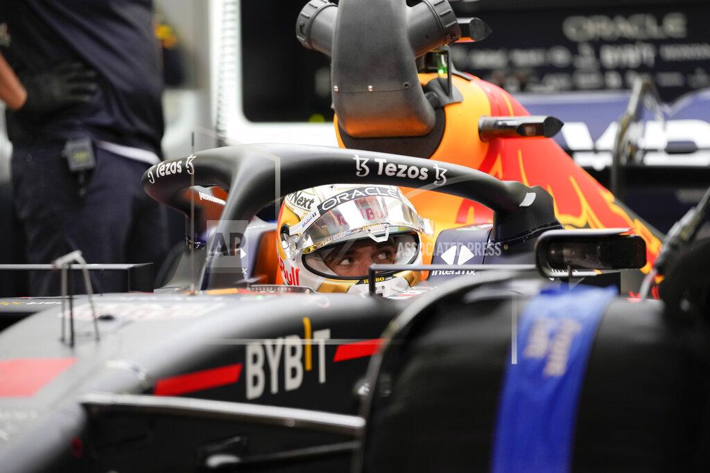 Hassan Ammar Red Bull driver Max Verstappen of the Netherlands gets ready during a practice for theFormula One Bahrain Grand Prix it in Sakhir, Bahrain, Friday, March 18, 2022. (AP Photo/Hassan Ammar)