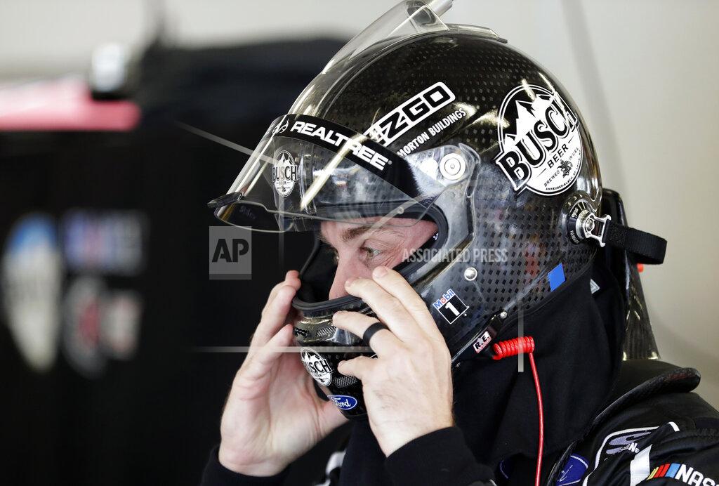 John Raoux Kevin Harvick adjusts his helmet before the start of a NASCAR auto race practice session at Daytona International Speedway, Saturday, Feb. 9, 2019, in Daytona Beach, Fla. (AP Photo/John Raoux)
