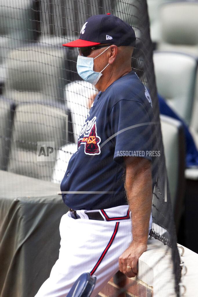 John Bazemore Atlanta Braves manager Brian Snitker watches during an intrasquad baseball game Thursday, July 16, 2020, in Atlanta. (AP Photo/John Bazemore)