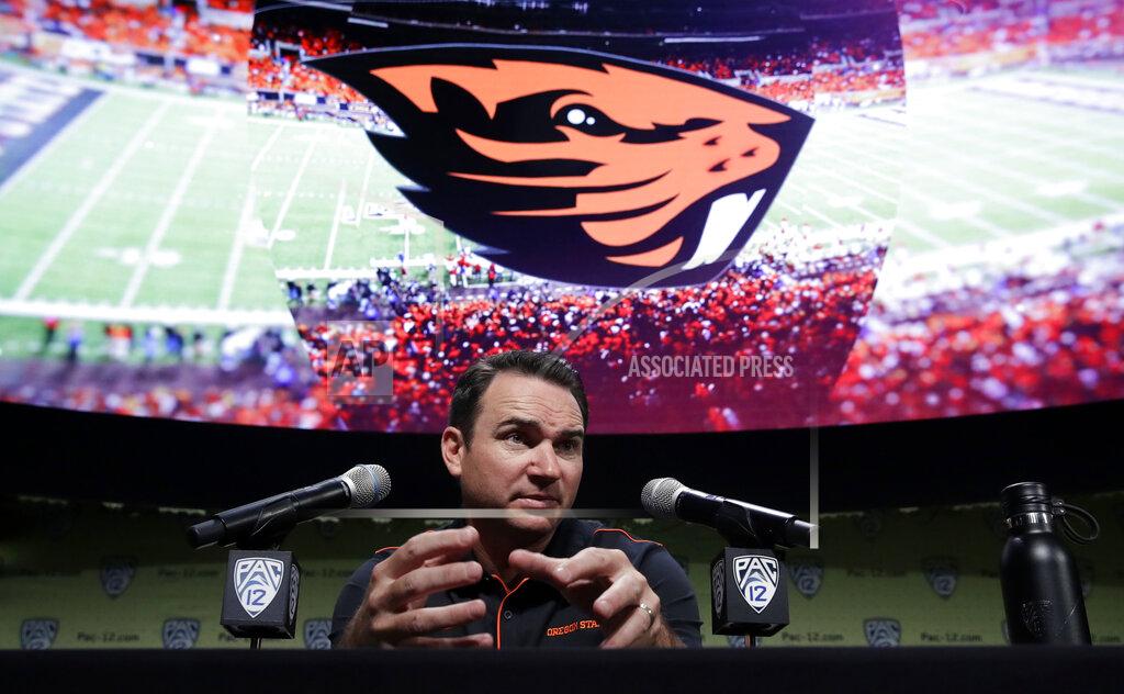 Marcio Jose Sanchez FILE - In this July 24, 2019, file photo, Oregon State head coach Jonathan Smith answers questions during the Pac-12 Conference NCAA college football Media Day in Los Angeles. The former Beavers quarterback knew what he was getting into when he took over after the disastrous 2017 season, when Oregon State won just a single game. He knows change will be incremental. (AP Photo/Marcio Jose Sanchez, File)