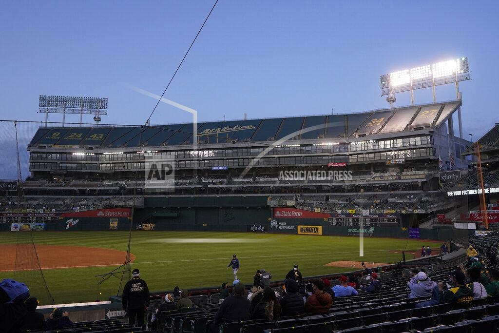 Jeff Chiu A power outage in the left field light bank causes the second baseball game of a doubleheader between the Oakland Athletics and the Minnesota Twins to be delayed during the fifth inning in Oakland, Calif., Tuesday, April 20, 2021. (AP Photo/Jeff Chiu)