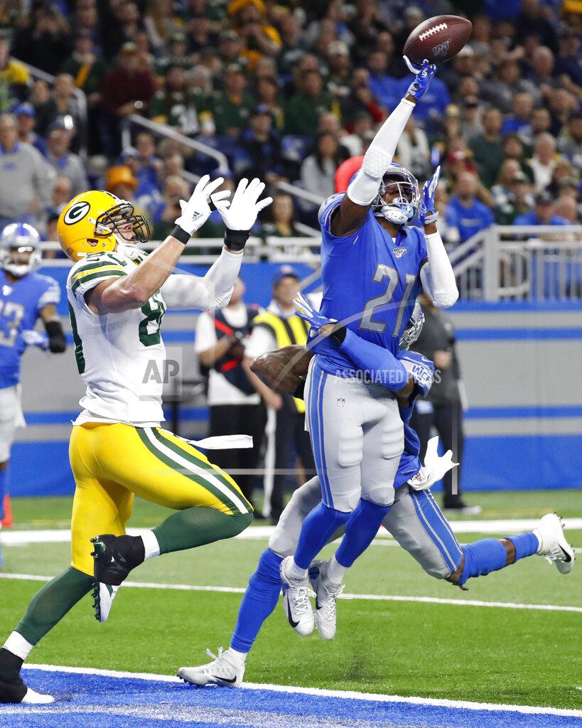 Rick Osentoski Detroit Lions free safety Tracy Walker (21) deflects a pass intended for Green Bay Packers tight end Jimmy Graham (80) during the second half of an NFL football game, Sunday, Dec. 29, 2019, in Detroit. (AP Photo/Rick Osentoski)