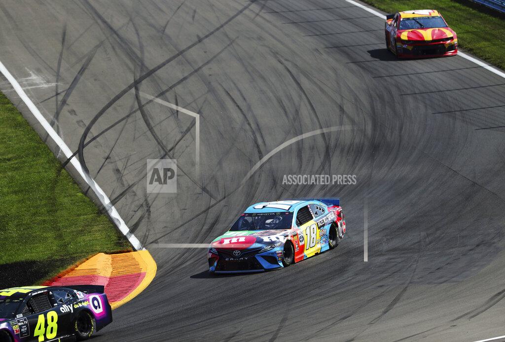 John Munson Kyle Busch heads into Turn 1 during a NASCAR Cup Series auto race at Watkins Glen International, Sunday, Aug. 4, 2019, in Watkins Glen, N.Y. (AP Photo/John Munson)