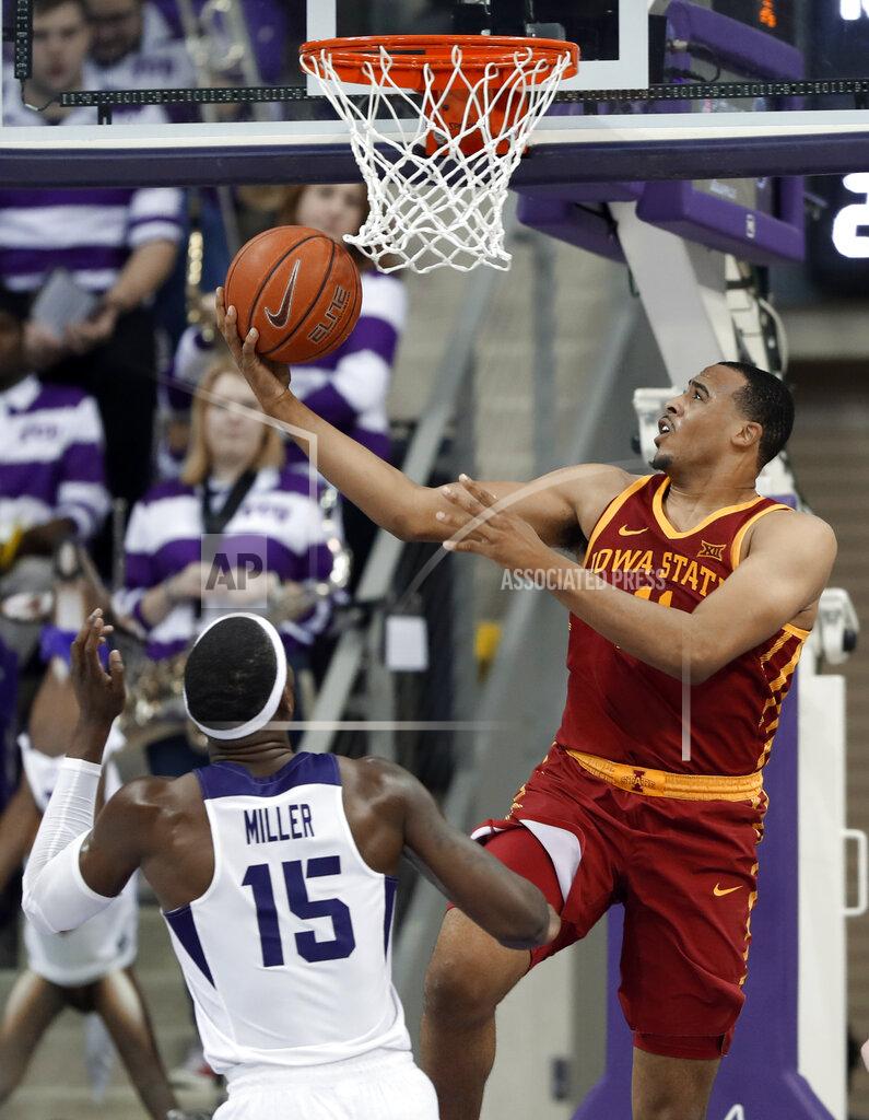 Tony Gutierrez TCU forward JD Miller (15) watches as Iowa State guard Talen Horton-Tucker (11) goes up for a reverse layup in the second half of an NCAA college basketball game in Fort Worth, Texas, Saturday, Feb. 23, 2019. (AP Photo/Tony Gutierrez)