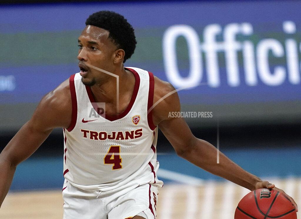 John Locher FILE - In this March 11, 2021, file photo, Southern California's Evan Mobley plays against Utah in an NCAA college basketball game in the quarterfinal round of the Pac-12 men's tournament in Las Vegas. Mobley is the headliner among big men in this year's NBA draft. (AP Photo/John Locher, File)