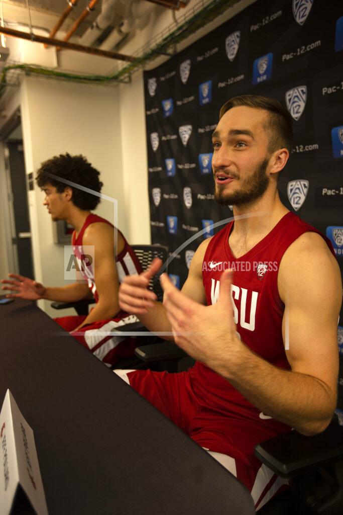 D. Ross Cameron Washington State's CJ Elleby, left, and Jeff Pollard speak during the Pac-12 NCAA college basketball media day Tuesday, Oct. 8, 2019 in San Francisco. (AP Photo/D. Ross Cameron)