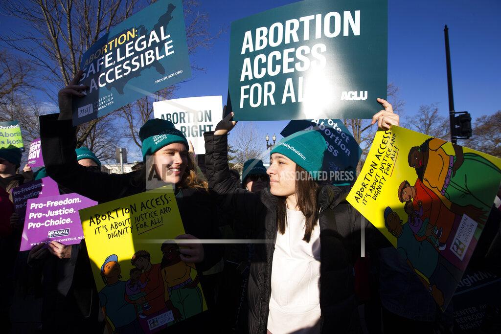 Jose Luis Magana Abortion rights demonstrators rally outside of the U.S. Supreme Court in Washington, Wednesday, March 4, 2020. Among abortion-rights activists, there's relief and optimism as the Biden administration takes power Biden is expected to soon issue executive orders reversing anti-abortion actions taken by Trump. (AP Photo/Jose Luis Magana, File)