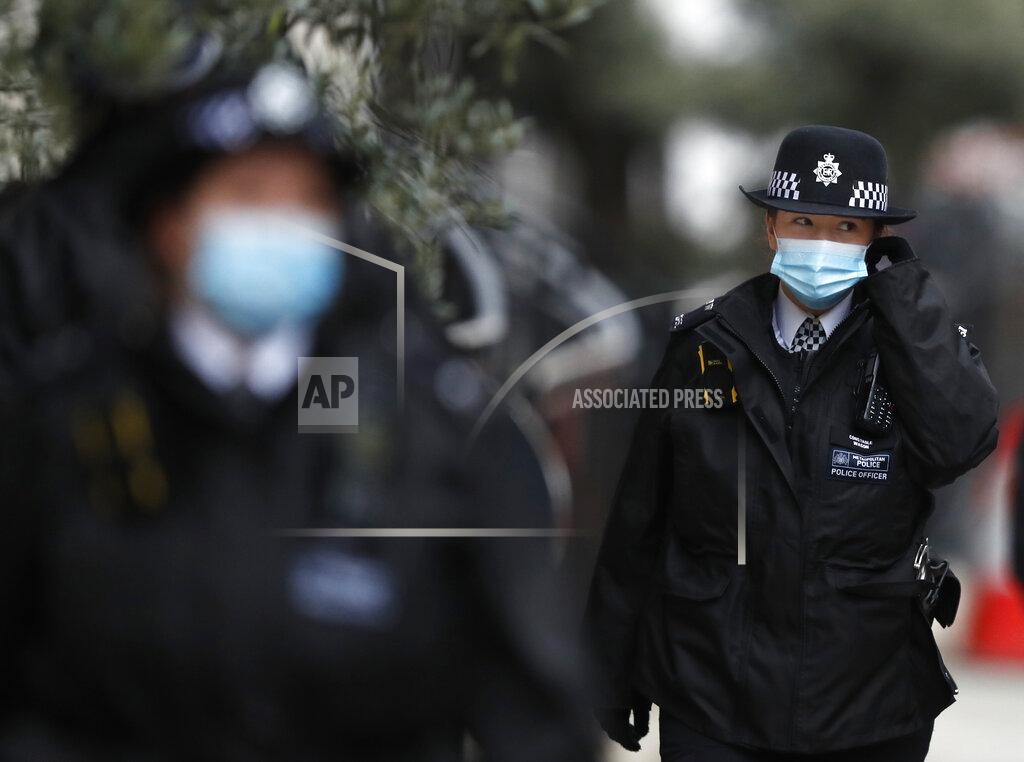 Alastair Grant Police stand guard outside the King Edward VII hospital In London, Monday, Feb. 22, 2021, where Britain's Prince Philip is being treated. Prince Philip, 99, was admitted to the hospital on Tuesday on the advice of his doctor in what Buckingham Palace described as “a precautionary measure.” (AP Photo/Alastair Grant)