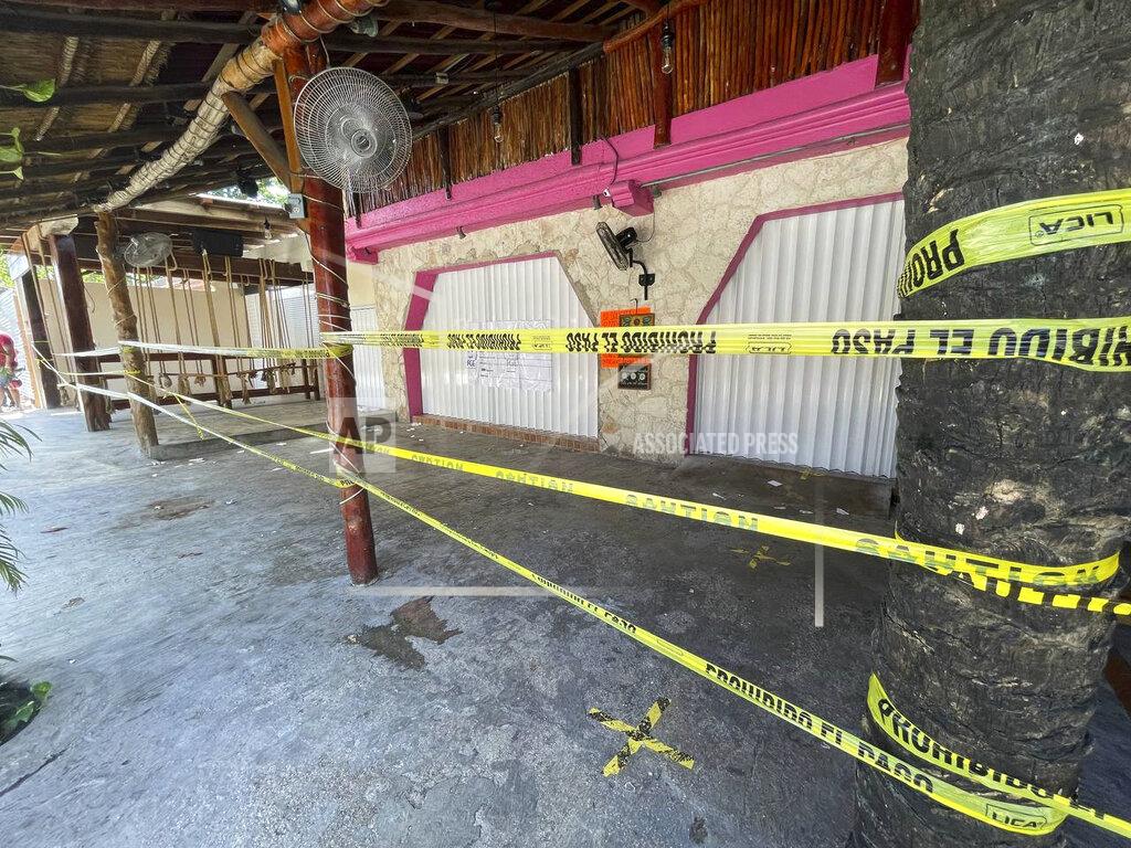 Christian Rojas Police security tape covers the exterior of a restaurant the day after a fatal shooting in Tulum, Mexico, Friday, Oct. 22, 2021. Two foreigners were killed and three wounded in a shooting in the Mexican Caribbean resort town of Tulum. (AP Photo/Christian Rojas)