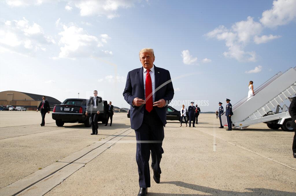 Alex Brandon President Donald Trump walks to speak to the press before boarding Air Force One, Friday, July 3, 2020, at Andrews Air Force Base, Md. Trump is en route to Mount Rushmore National Memorial. (AP Photo/Alex Brandon)