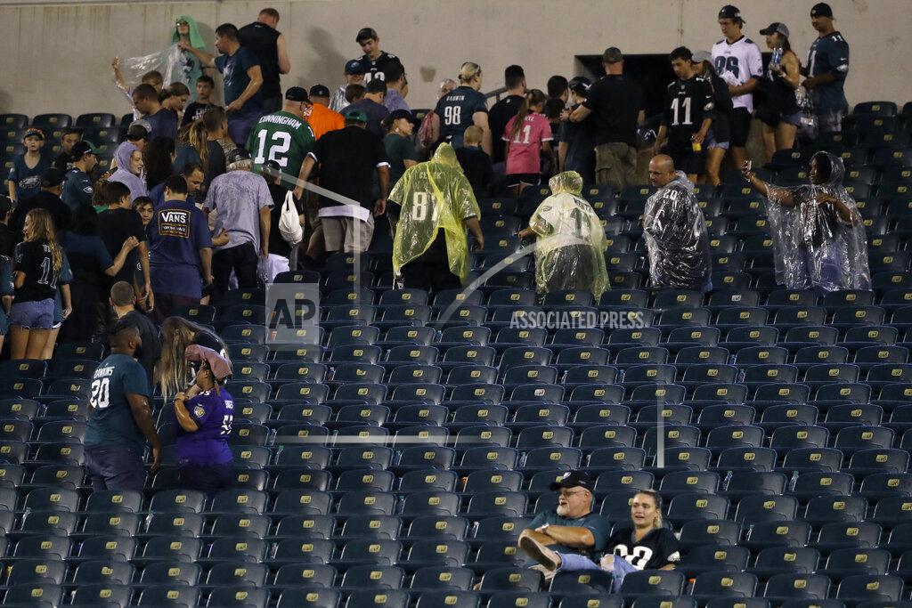 Matt Rourke Fans clear the stands as a storm ends a preseason NFL football game between the Philadelphia Eagles and the Baltimore Ravens, Thursday, Aug. 22, 2019, in Philadelphia. (AP Photo/Matt Rourke)