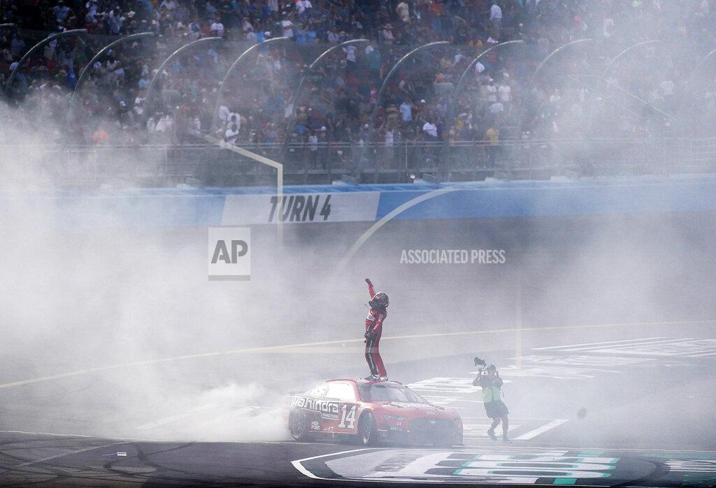 Darryl Webb Chase Briscoe, left, celebrates after winning a NASCAR Cup Series auto race at Phoenix Raceway, Sunday, March 13, 2022, in Avondale, Ariz. (AP Photo/Darryl Webb)
