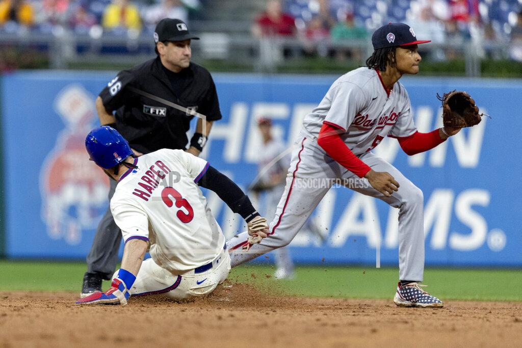 Laurence Kesterson Philadelphia Phillies' Bryce Harper (3) is safe at second base on a single by J.T. Realmuto before Washington Nationals shortstop CJ Abrams (5) can make a catch during the fifth inning of a baseball game, Sunday, Sept. 11, 2022, in Philadelphia. (AP Photo/Laurence Kesterson)