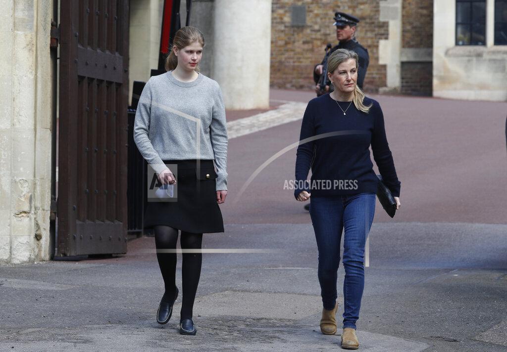 Alastair Grant Sophie, Countess of Wessex with her daughter Lady Louise Windsor, walk out of Windsor Castle in Windsor, England, Friday, April 16, 2021. Prince Philip husband of Britain's Queen Elizabeth II died April 9, aged 99, his funeral will take place Saturday at Windsor Castle in St George's Chapel. (AP Photo/Alastair Grant)