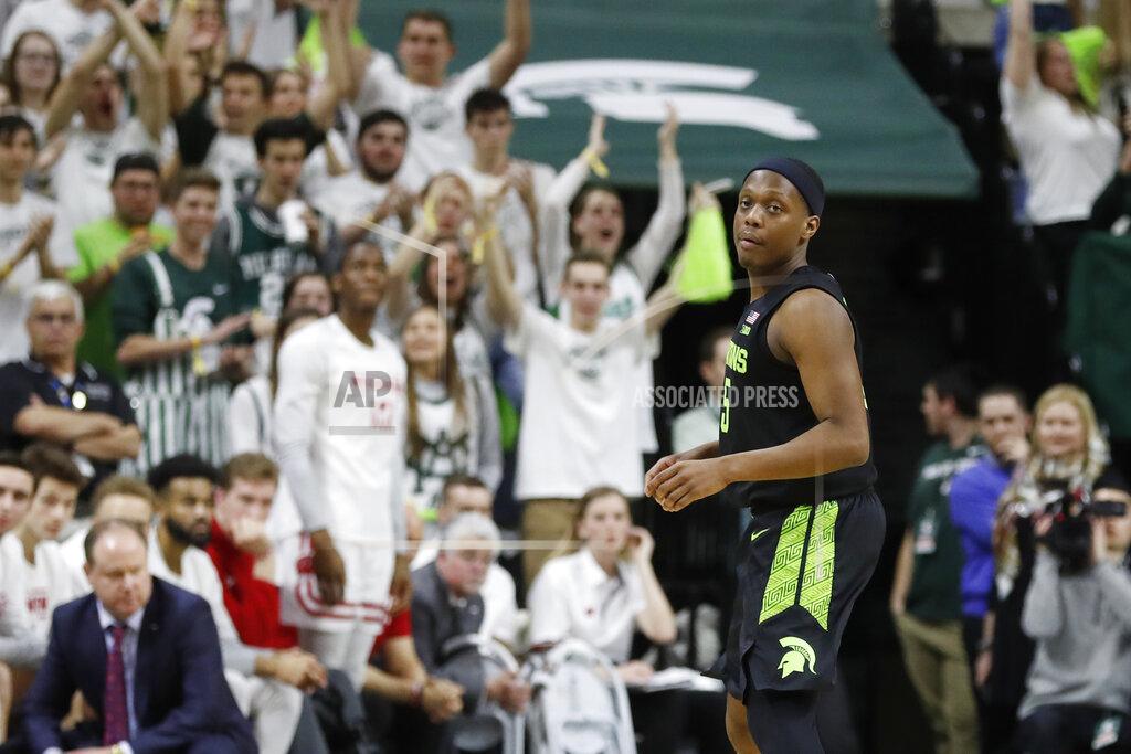 Carlos Osorio Fans cheer after Michigan State guard Cassius Winston attained the all-time Big Ten and Michigan State records for assists during the second half of an NCAA college basketball game against Wisconsin, Friday, Jan. 17, 2020, in East Lansing, Mich. (AP Photo/Carlos Osorio)