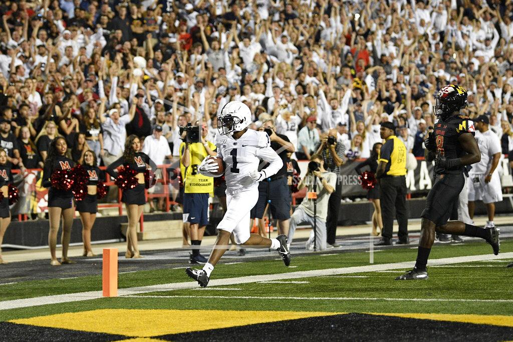 Nick Wass Penn State wide receiver KJ Hamler (1) scores a touchdown past Maryland defensive back Jordan Mosley (18) during the first half of an NCAA college football game, Friday, Sept. 27, 2019, in College Park, Md. (AP Photo/Nick Wass)
