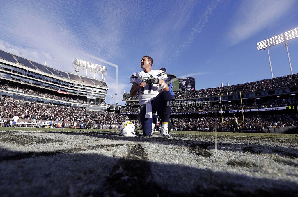 Marcio Jose Sanchez FILE - In this Oct. 12, 2016, file photo, San Diego Chargers quarterback Philip Rivers (17) kneels after an NFL football game against the Oakland Raiders in Oakland, Calif. From his first career start in 2006 to some riveting comebacks and crushing defeats, Chargers quarterback Philip Rivers has had plenty of memorable experiences playing against the Raiders at the Oakland Coliseum. So there will be a bit of nostalgia when Rivers plays his final scheduled game there Thursday night, Nov. 7, 2019, when the Chargers (4-5) take on the Raiders (4-4) in a game crucial for both teams' playoff hopes. (AP Photo/Marcio Jose Sanchez, File)