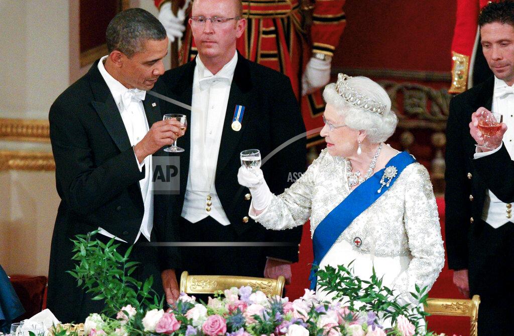 Lewis Whyld FILE - In this May 24, 2011, file photo Queen Elizabeth II, and U.S. President Barack Obama attend a state banquet in Buckingham Palace, London. (AP Photo/Lewis Whyld, Pool, File)