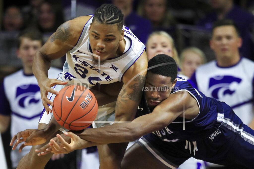 Orlin Wagner Monmouth forward Nikkei Rutty, right, and Kansas State forward Levi Stockard III (34) compete for the ball during the first half of an NCAA college basketball game in Manhattan, Kan., Wednesday, Nov. 13, 2019. (AP Photo/Orlin Wagner)
