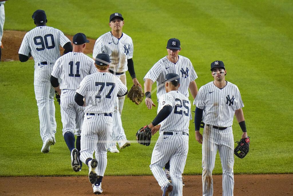 Frank Franklin Ii The New York Yankees celebrate their win against the Toronto Blue Jays after the second game of a baseball doubleheader Thursday, May 27, 2021, in New York. The Yankees won 5-3. (AP Photo/Frank Franklin II)