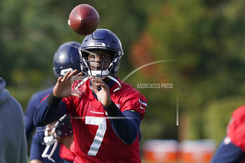 Ted S. Warren Seattle Seahawks backup quarterback Geno Smith (7) catches a ball during warmups before NFL football practice, Wednesday, Oct. 13, 2021, in Renton, Wash. Starting quarterback Russell Wilson had surgery on his hand last Friday, and Smith is expected to be the starting quarterback Sunday when the Seahawks play the Pittsburgh Steelers on the road. (AP Photo/Ted S. Warren)