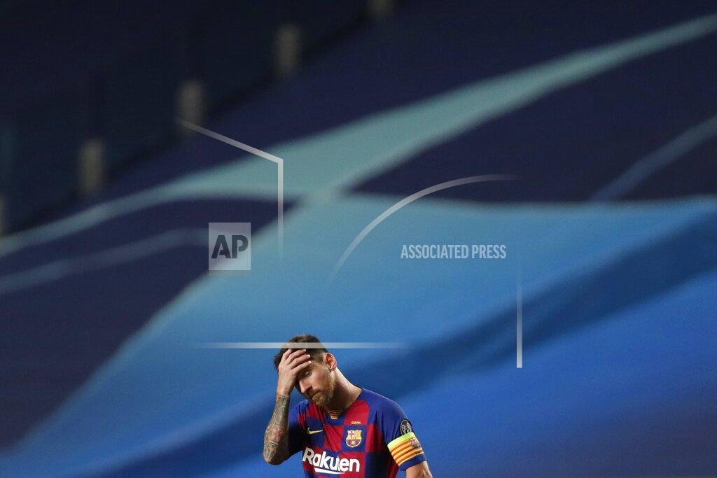 Manu Fernandez Barcelona's Lionel Messi reacts during the Champions League quarterfinal match between FC Barcelona and Bayern Munich at the Luz stadium in Lisbon, Portugal, Friday, Aug. 14, 2020. Gerard Piqué says Barcelona "hit rock bottom" in an 8-2 humiliation from Bayern Munich in the Champions League quarterfinals. It's 74 years since Barcelona conceded eight goals in a game. (AP Photo/Manu Fernandez/Pool)