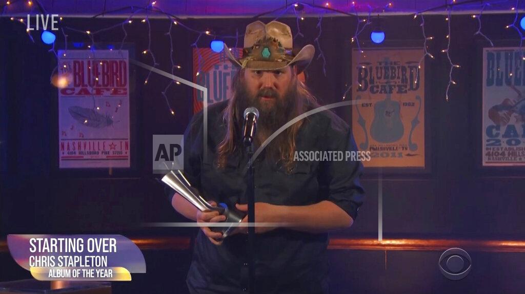 Uncredited In this video grab provided by CBS, Chris Stapleton accepts the award for album of the year for "Starting Over" during the 56th annual Academy of Country Music Awards on Sunday, April 18, 2021, at the Bluebird Cafe in Nashville, Tenn. (CBS via AP)