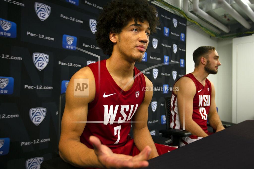 D. Ross Cameron Washington State's CJ Elleby, left, and Jeff Pollard speak during the Pac-12 NCAA college basketball media day Tuesday, Oct. 8, 2019 in San Francisco. (AP Photo/D. Ross Cameron)