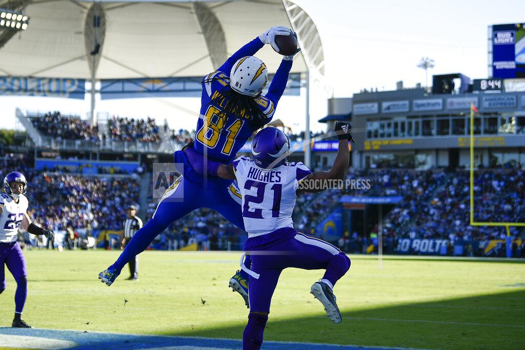 Kelvin Kuo Los Angeles Chargers wide receiver Mike Williams (81) grabs a touchdown catch in the end zone as Minnesota Vikings cornerback Mike Hughes (21) defends during the first half of an NFL football game Sunday, Dec. 15, 2019, in Carson, Calif. (AP Photo/Kelvin Kuo)