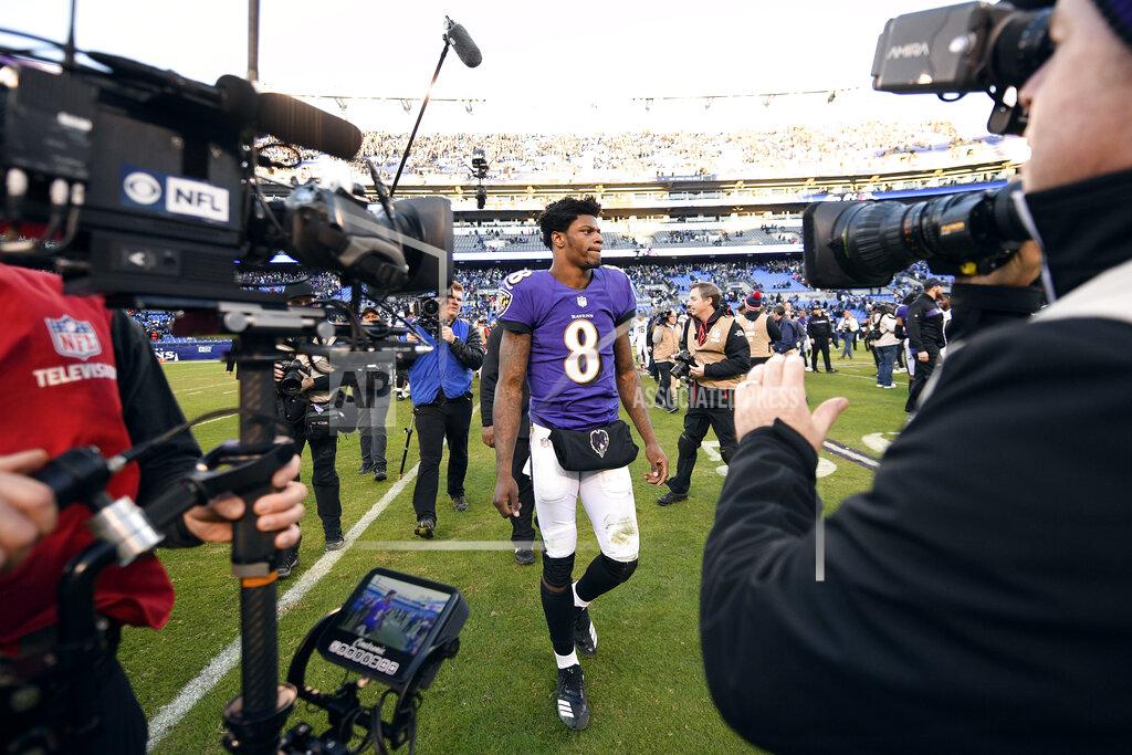 Nick Wass Baltimore Ravens quarterback Lamar Jackson (8) walks off the field after an NFL wild card playoff football game against the Los Angeles Chargers, Sunday, Jan. 6, 2019, in Baltimore. Los Angeles won 23-17. (AP Photo/Nick Wass)