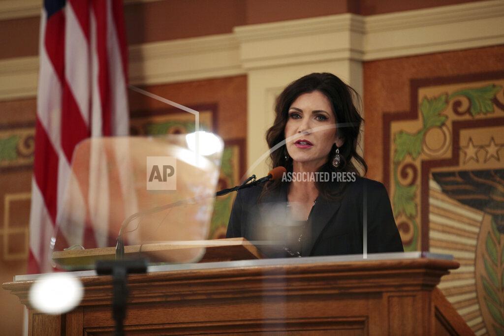 South Dakota Gov. Kristi Noem addresses the Legislature, Tuesday, Feb. 9, 2021, at the Capitol in Pierre. (AP Photo/Stephen Groves)