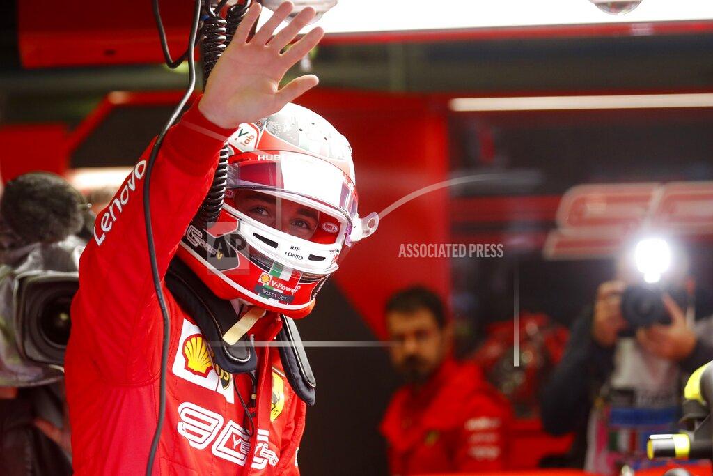 Antonio Calanni Ferrari driver Charles Leclerc of Monaco waves during the first free practice at the Monza racetrack, in Monza, Italy, Friday, Sept. 6, 2019. The Formula one race will be held on Sunday. (AP Photo/Antonio Calanni)