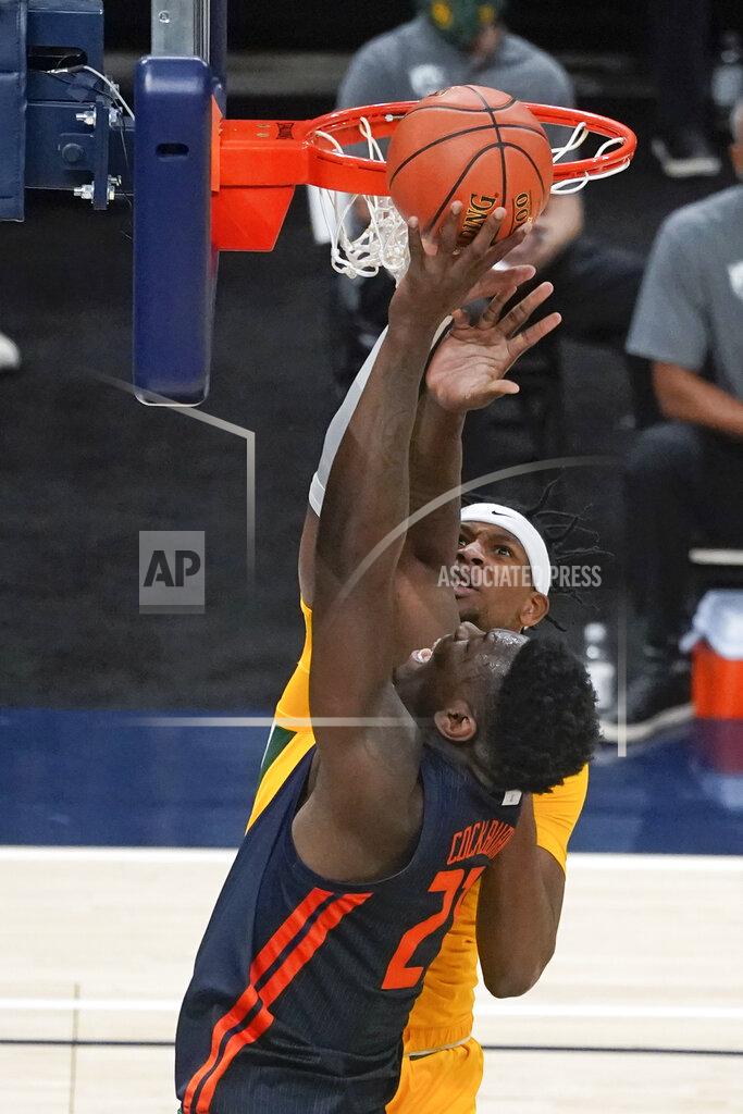 Darron Cummings Illinois' Kofi Cockburn (21) puts up a shot against Baylor's Flo Thamba (0) during the first half of an NCAA college basketball game, Wednesday, Dec. 2, 2020, in Indianapolis. (AP Photo/Darron Cummings)