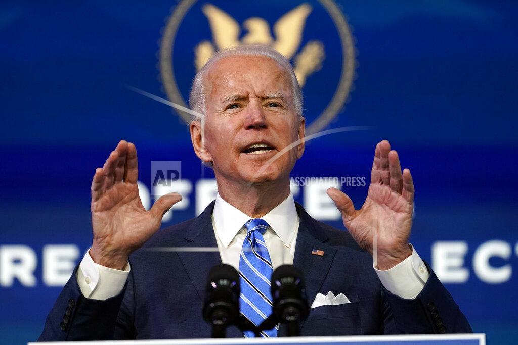 Matt Slocum President-elect Joe Biden speaks about the COVID-19 pandemic during an event at The Queen theater, Thursday, Jan. 14, 2021, in Wilmington, Del. (AP Photo/Matt Slocum)