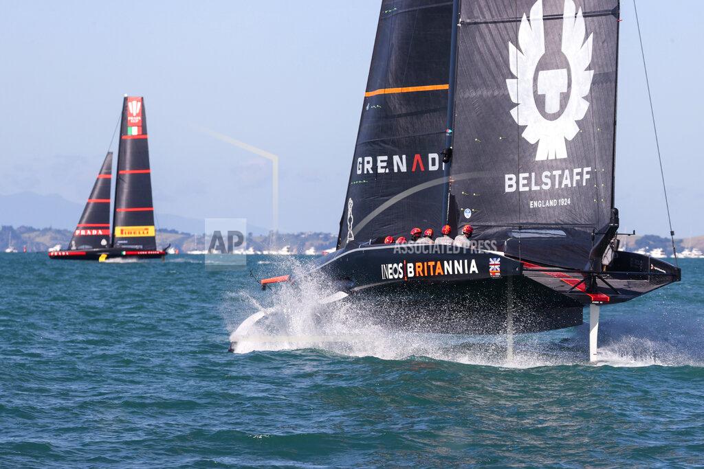 Brett Phibbs Britain's INEOS Team UK, right, trails Italy's Luna Rossa in race seven of the Prada Cup on Auckland's Waitemata Harbour, New Zealand, Sunday, Feb.21, 2021. (Brett Phibbs/NZ Herald via AP)